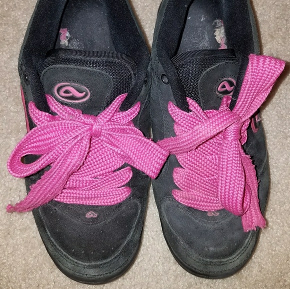 pink and black skate shoes